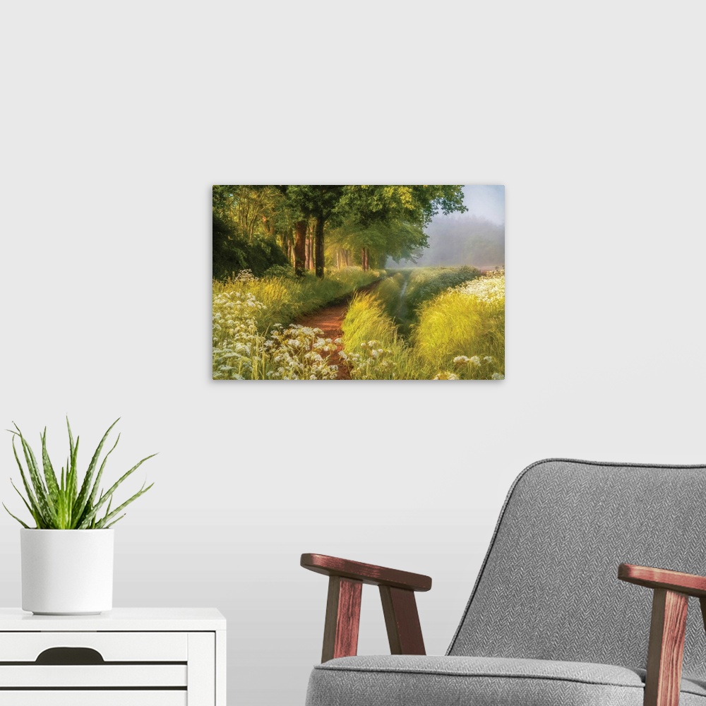 A modern room featuring A photo with a semblance of a painting displays a hidden pathway in a meadow during spring.
