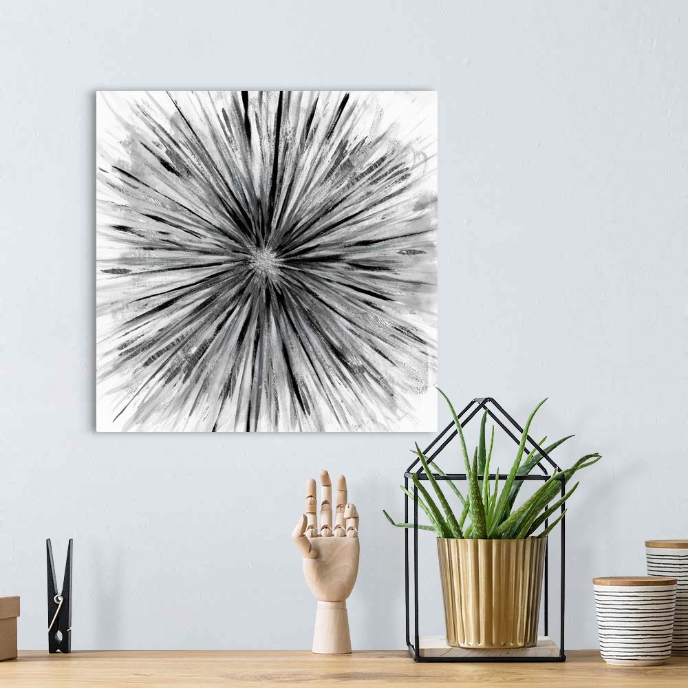 A bohemian room featuring Square abstract artwork of a black and grey sunburst design on a white background.