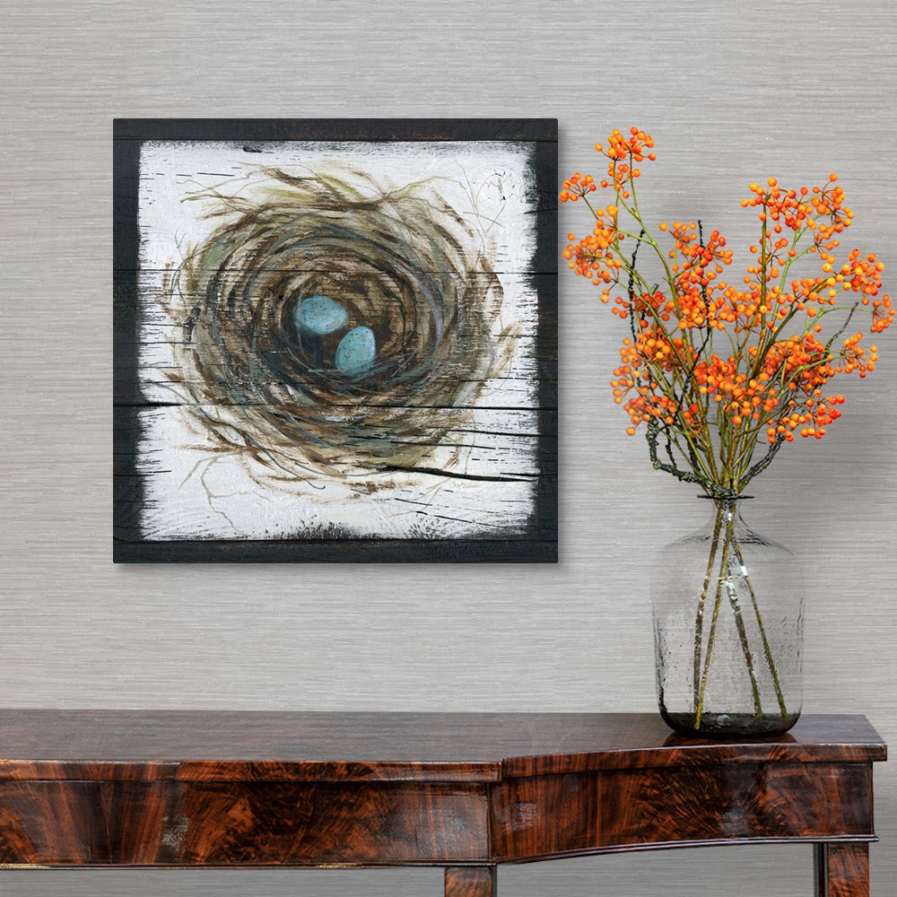 A traditional room featuring A wooden painting of a bird's nest with two eggs inside.