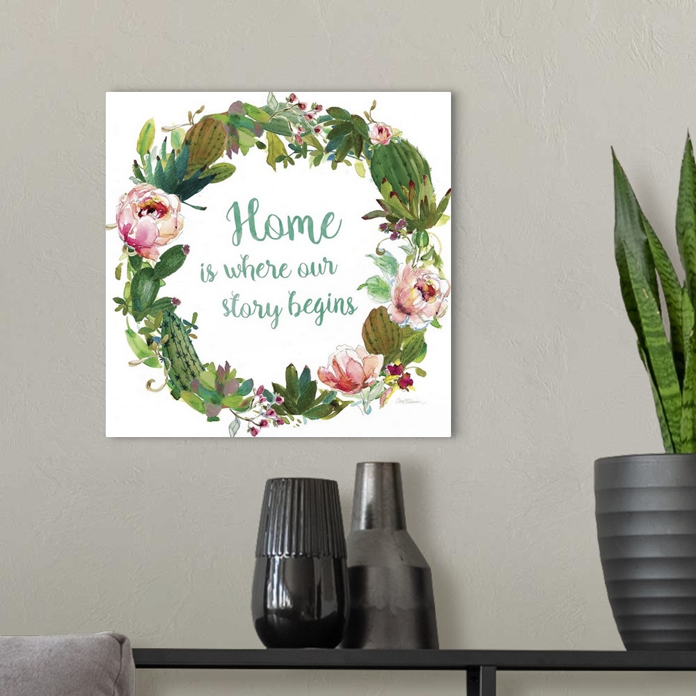 A modern room featuring Square watercolor painting with a wreath made out of flowers and succulents and the phrase "Home ...