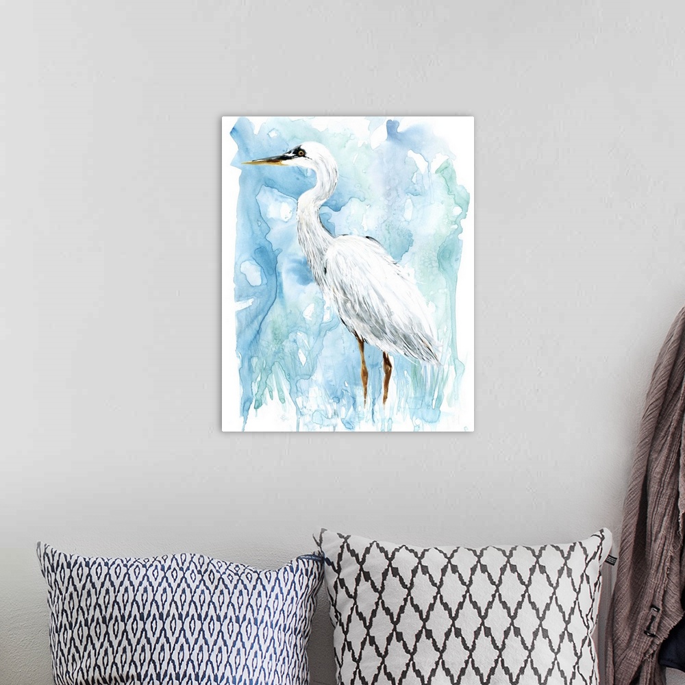 A bohemian room featuring Watercolor painting of a white Egret on a blue background.