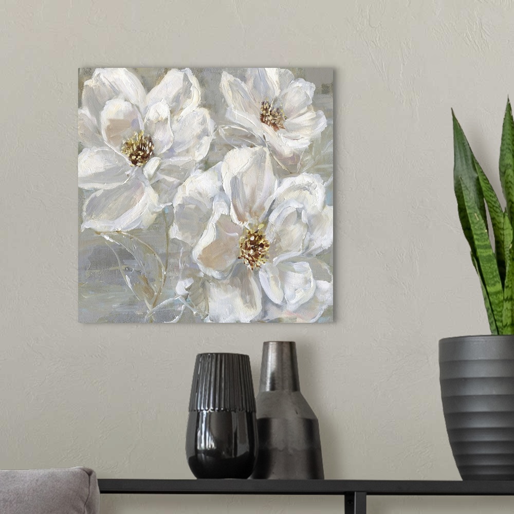 A modern room featuring Square contemporary painting of three white flowers on a neutral colored background with light hi...