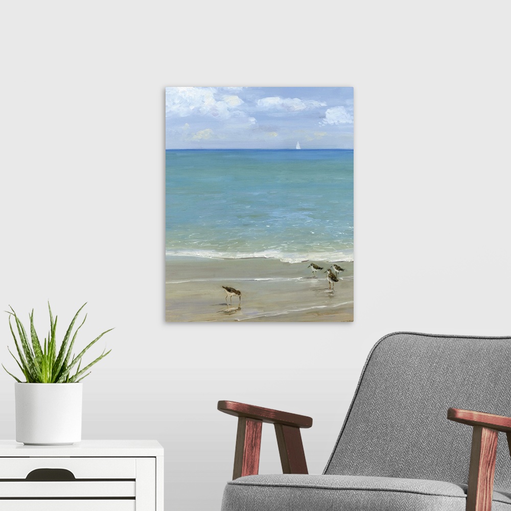 A modern room featuring Contemporary painting of the seashore with seabirds in the foreground and a sailboat in the dista...