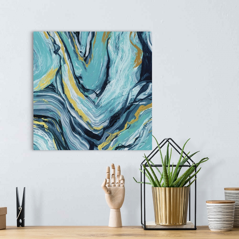 A bohemian room featuring Abstract art of teal, blue, and gold agate.
