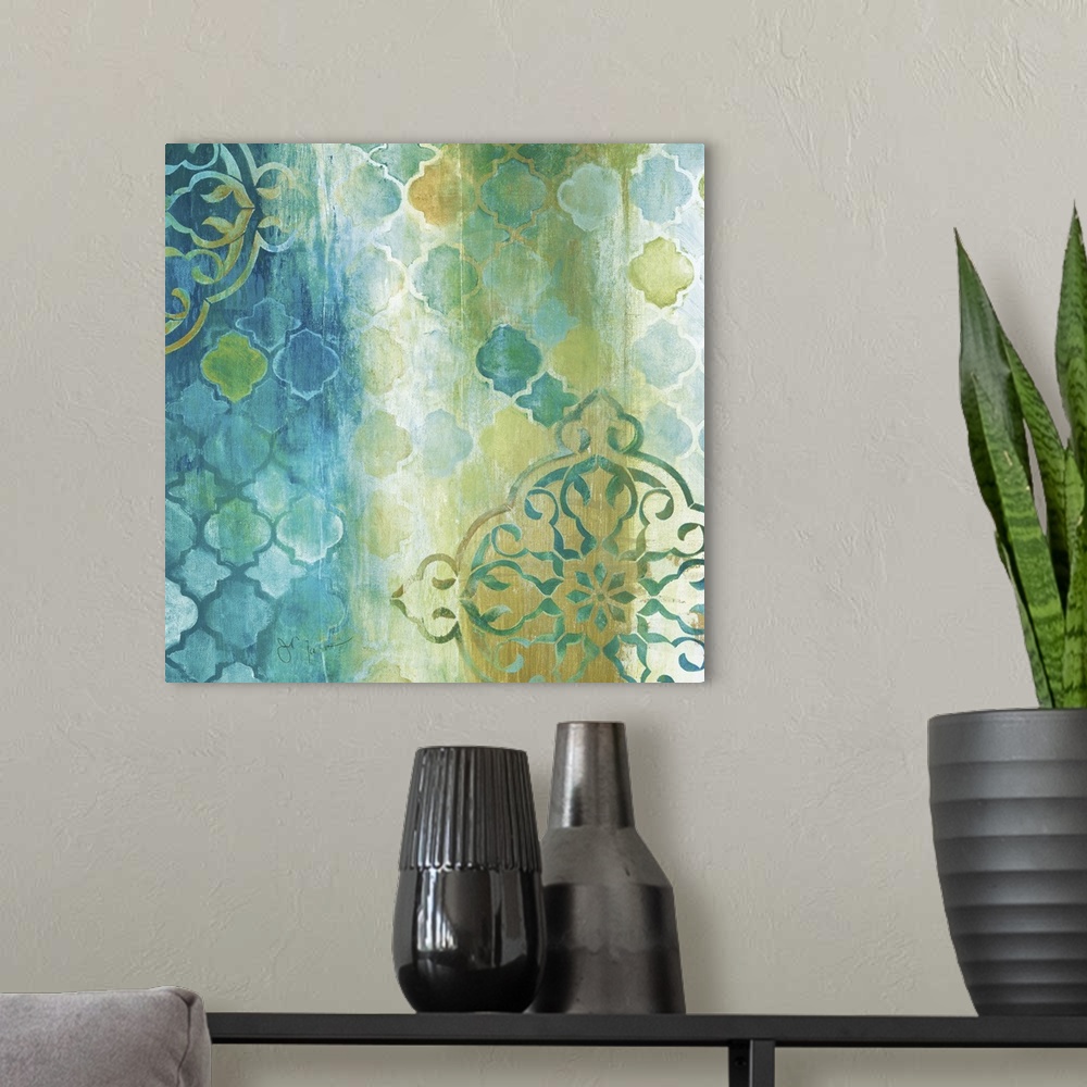 A modern room featuring Square painting in teal, gold, green, and white with a patterned print.