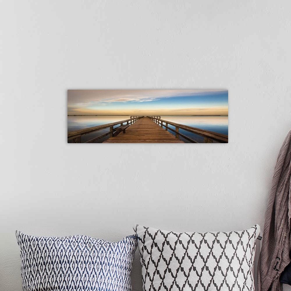 A bohemian room featuring Photograph of a long, wooden pier over the Terra Ceia Bay in Florida with a golden sunset.