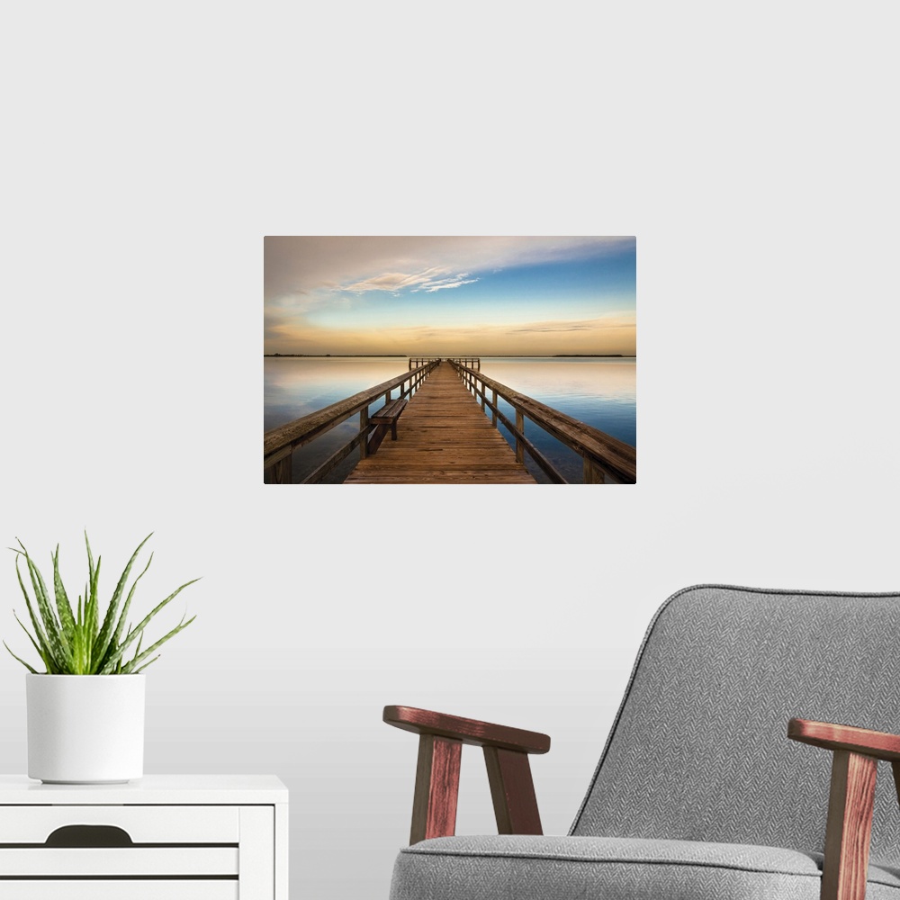 A modern room featuring Photograph of a long, wooden pier over the Terra Ceia Bay in Florida with a golden sunset.