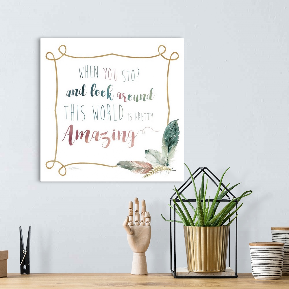 A bohemian room featuring "When You Stop And Look Around This World Is Pretty Amazing" framed with watercolor feathers on t...