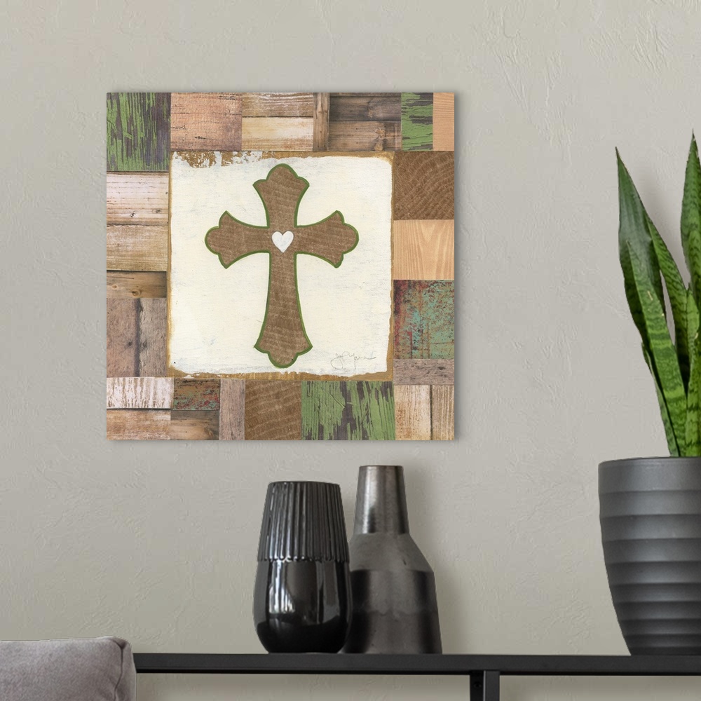 A modern room featuring A decorative painting of a wooden cross outlined in green with a white heart in the middle painte...