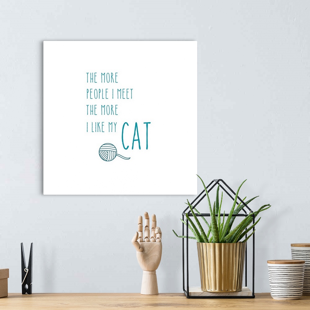 A bohemian room featuring Humorous sentiment art for cat lovers.
