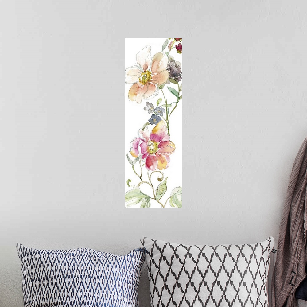 A bohemian room featuring Tall watercolor painting of pink, blue, and orange flowers climbing up the canvas with green stem...