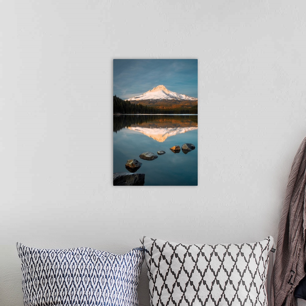 A bohemian room featuring Snow-capped Mount Hood reflected in the lake below at sunset, Oregon.