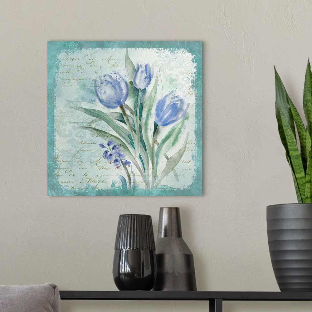 A modern room featuring Square decor in cool tones with abstract tulips on a blue bordered background with gold script.
