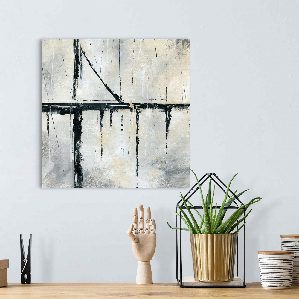 A bohemian room featuring Square abstract painting with bold, black, dripping lines mixed with thin black lines on a white,...
