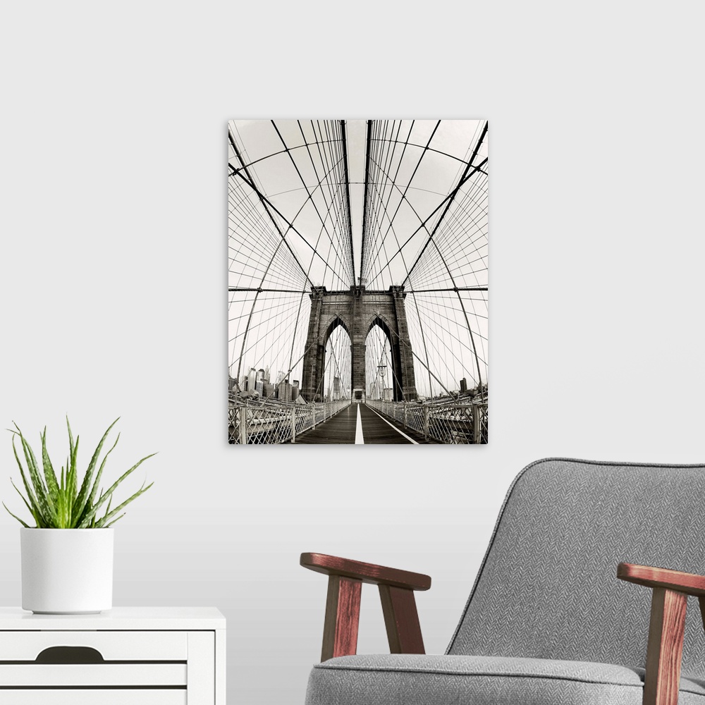 A modern room featuring Symmetric abstract photograph of the Brooklyn Bridge with a vintage color to it.