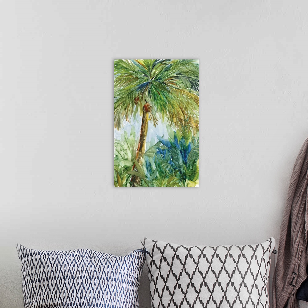 A bohemian room featuring Watercolor painting of a tropical palm tree landscape in shades of green, blue, yellow, and brown.