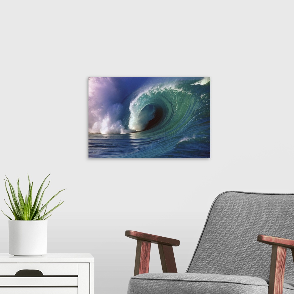 A modern room featuring A photograph of a big wave with blue, green, and magenta hues.