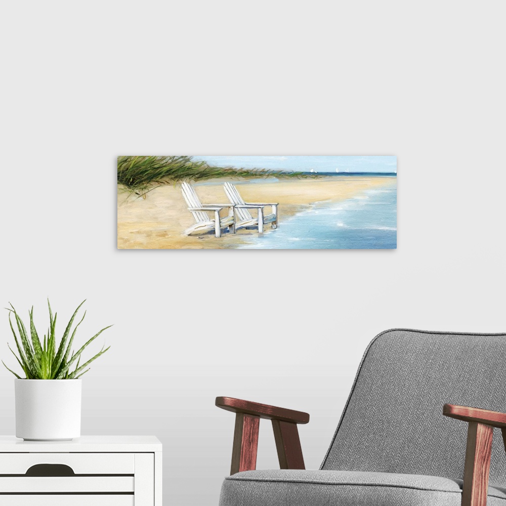 A modern room featuring Contemporary painting of two white beach chairs at the edge of the ocean on the coast.