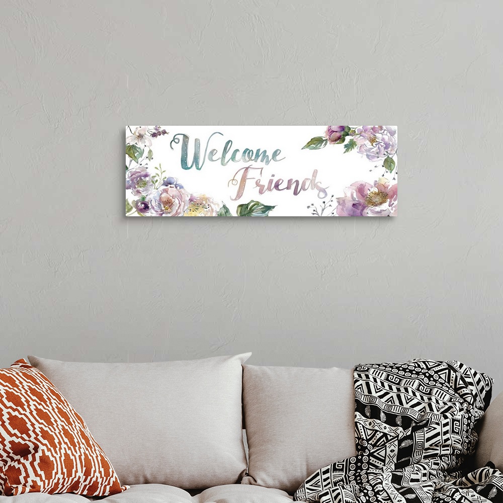 A bohemian room featuring "Welcome Friends" surrounded by watercolor flowers.