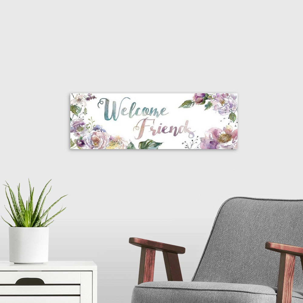 A modern room featuring "Welcome Friends" surrounded by watercolor flowers.