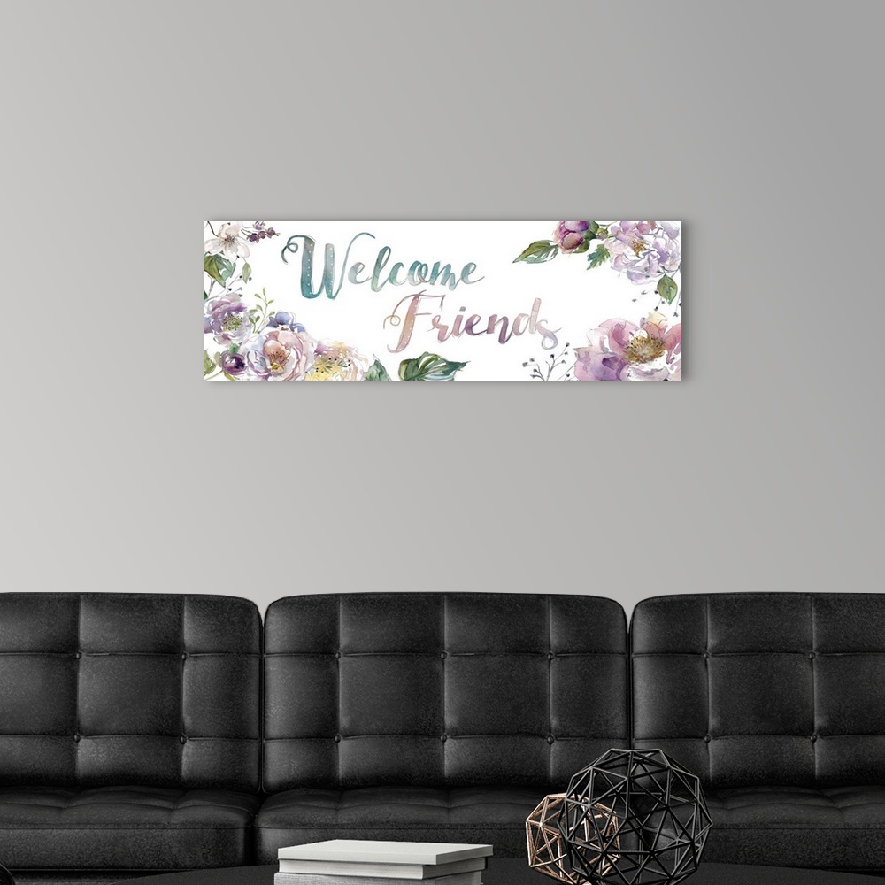 A modern room featuring "Welcome Friends" surrounded by watercolor flowers.