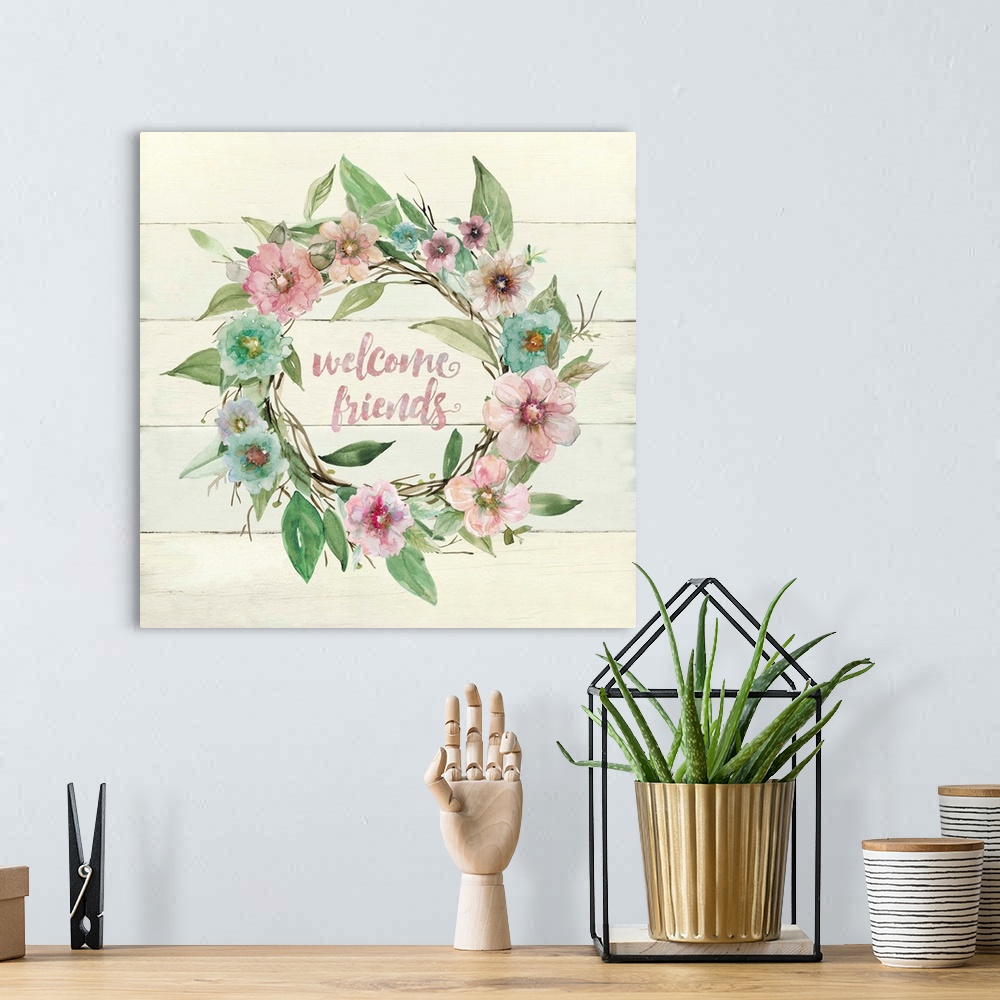 A bohemian room featuring The words, "Welcome friends" are encompassed by a wreath of watercolor flowers and branches and i...