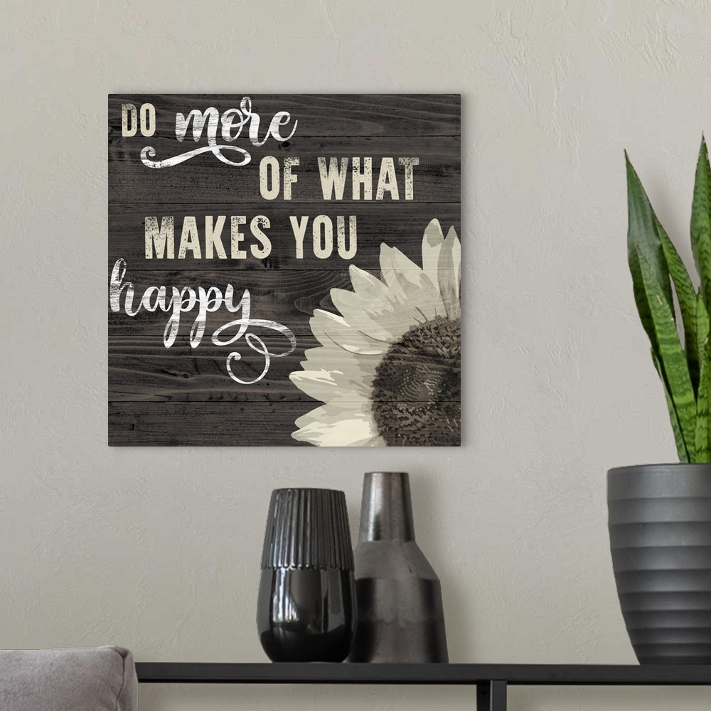A modern room featuring Decorative artwork of a sunflower and the text 'Do More Of what Makes You Happy' on a wood backdrop.