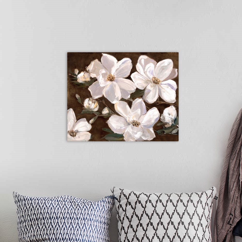 A bohemian room featuring Contemporary painting of large white flowers with broad petals on a rich brown background.