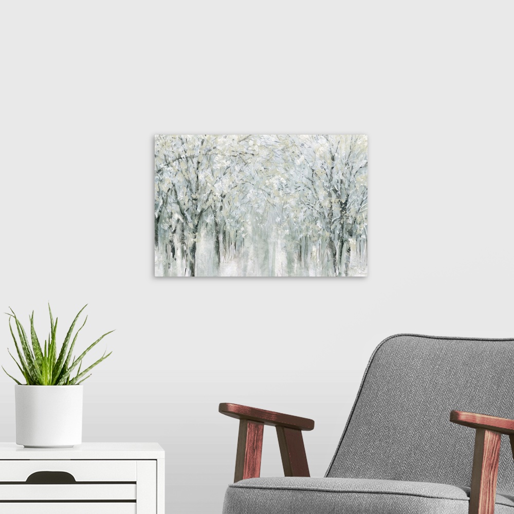 A modern room featuring Abstract painting of a winter scene with snow covered trees.