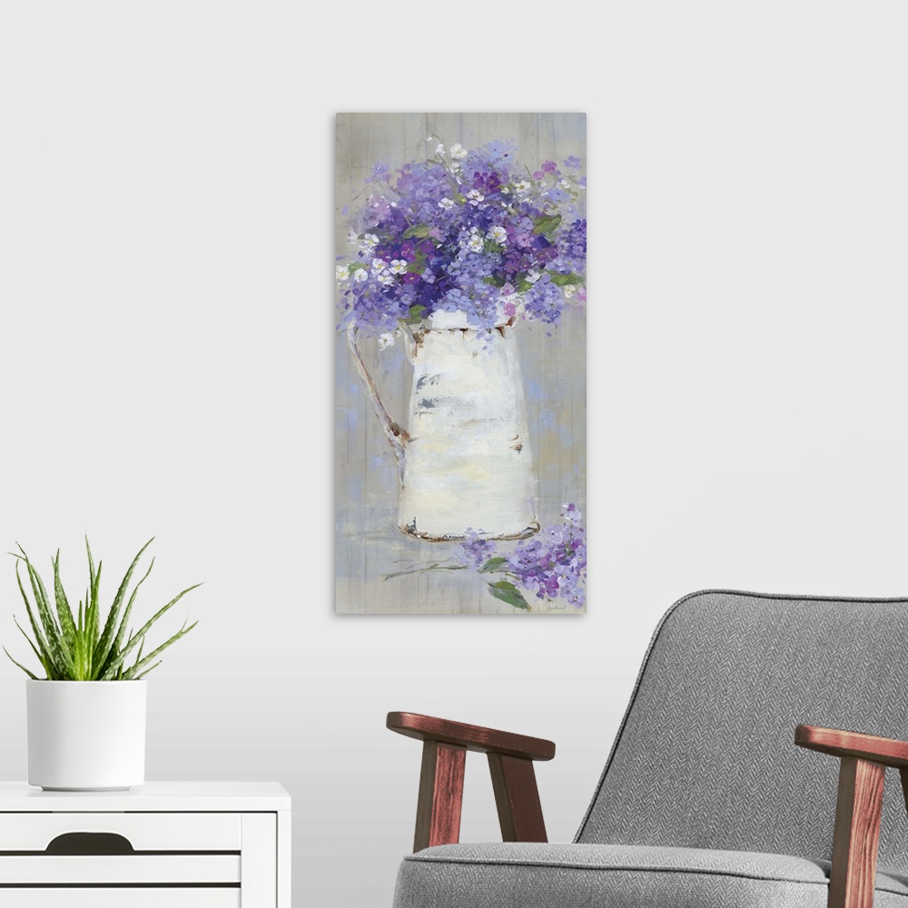 A modern room featuring A contemporary still life painting of a bouquet of purple and pink flowers arranged in a white pi...