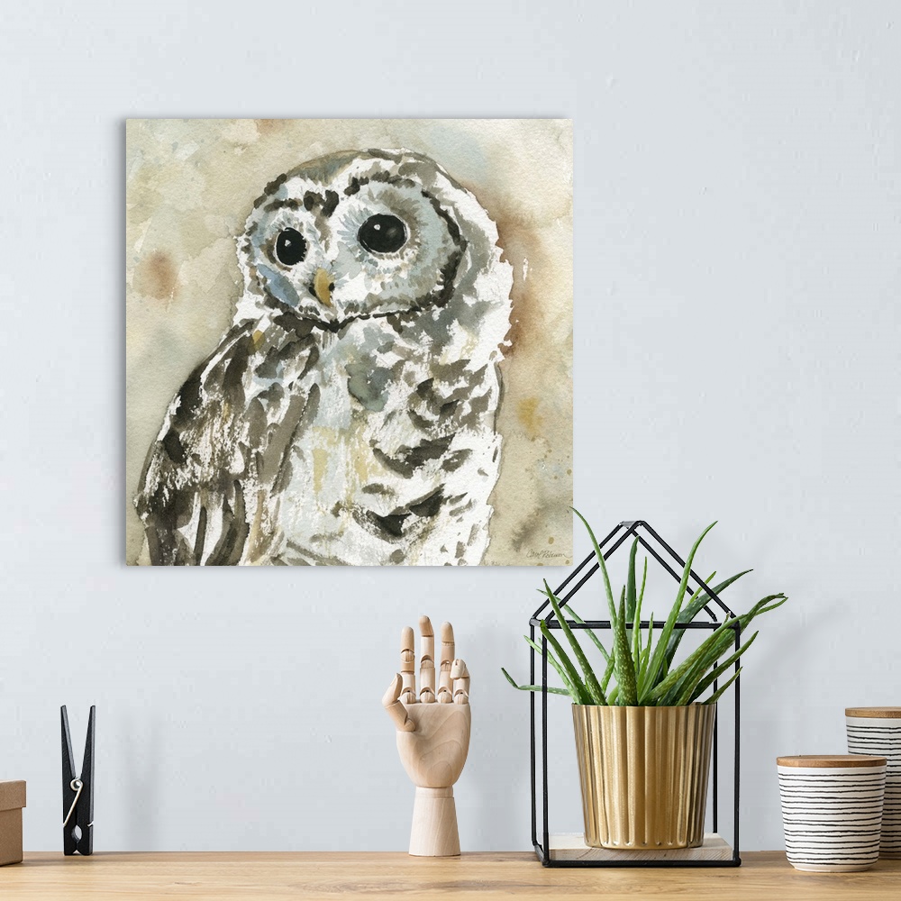 A bohemian room featuring A watercolor painting of an abstract  woodland owl.