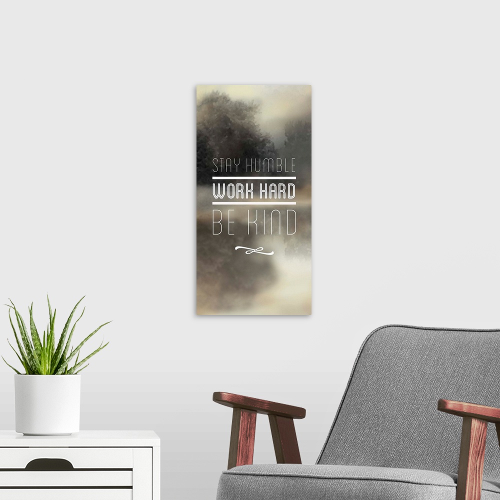 A modern room featuring Inspirational typography on a neutral colored background with a foggy tree scene.
