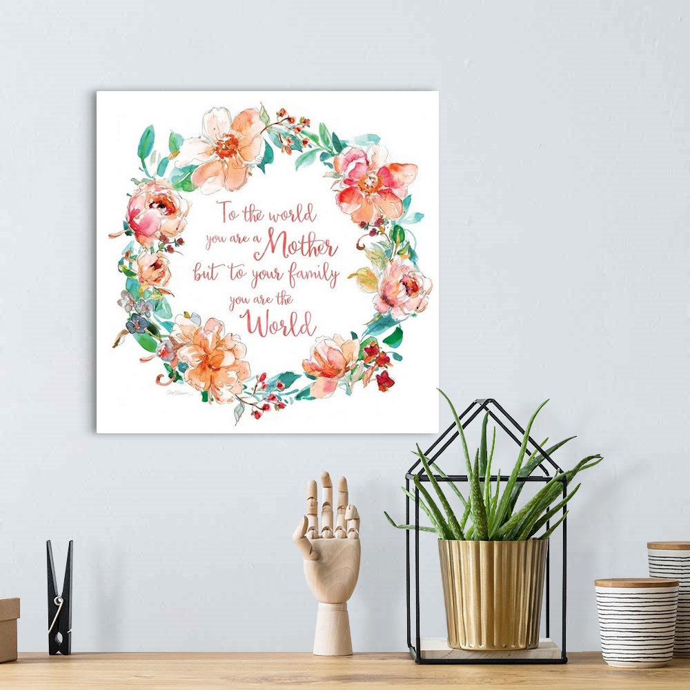 A bohemian room featuring "To The World You Are A Mother But To Your Family You Are The World" written in coral script insi...