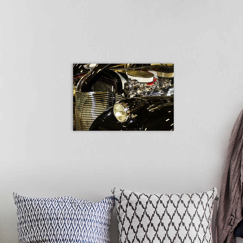 A bohemian room featuring Fine art photograph of the engine and grill of a vintage car.