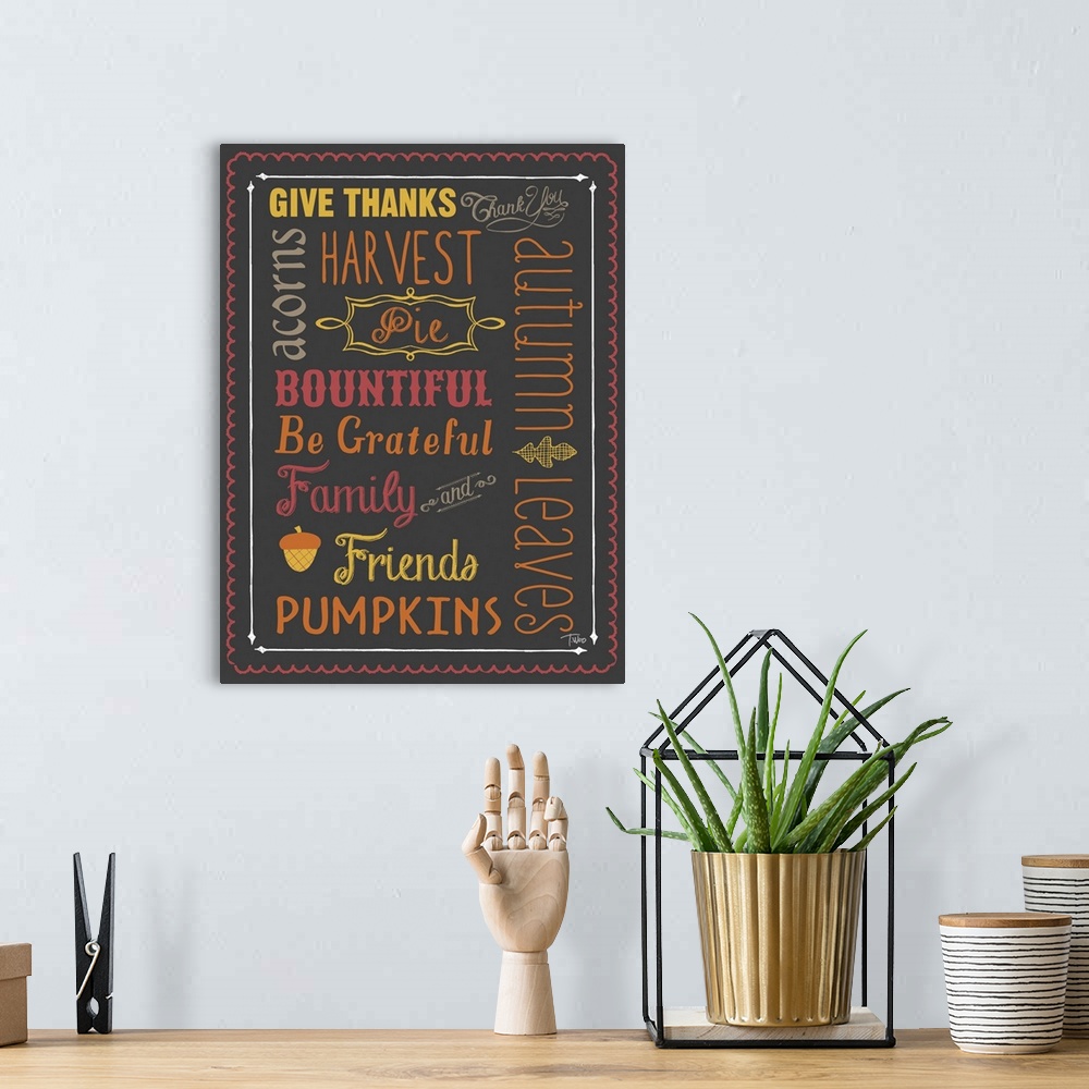 A bohemian room featuring Typography sign with Autumn themed words and colors.