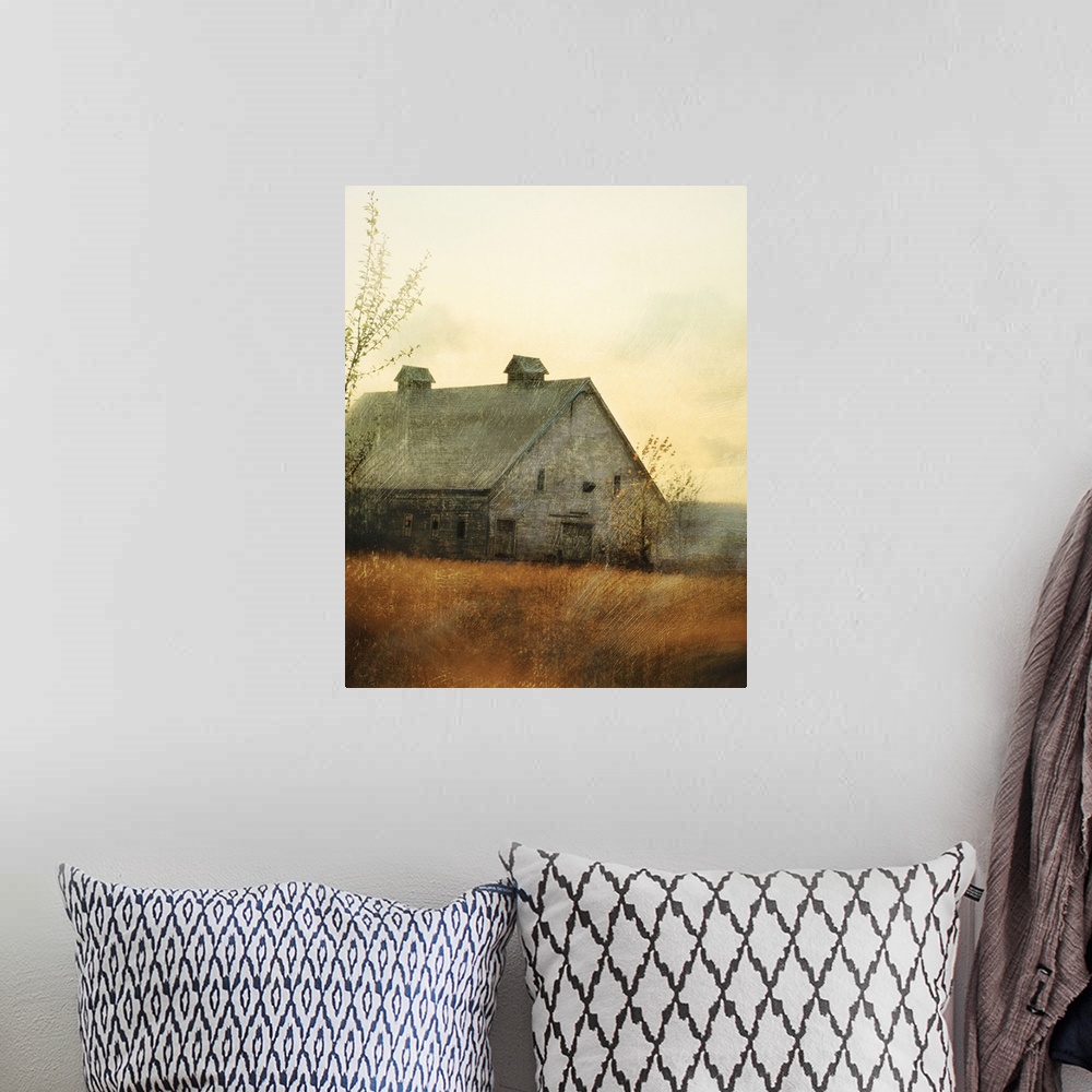 A bohemian room featuring Vertical painting on a big canvas of an old barn in a golden field at sunset. Painted with streak...