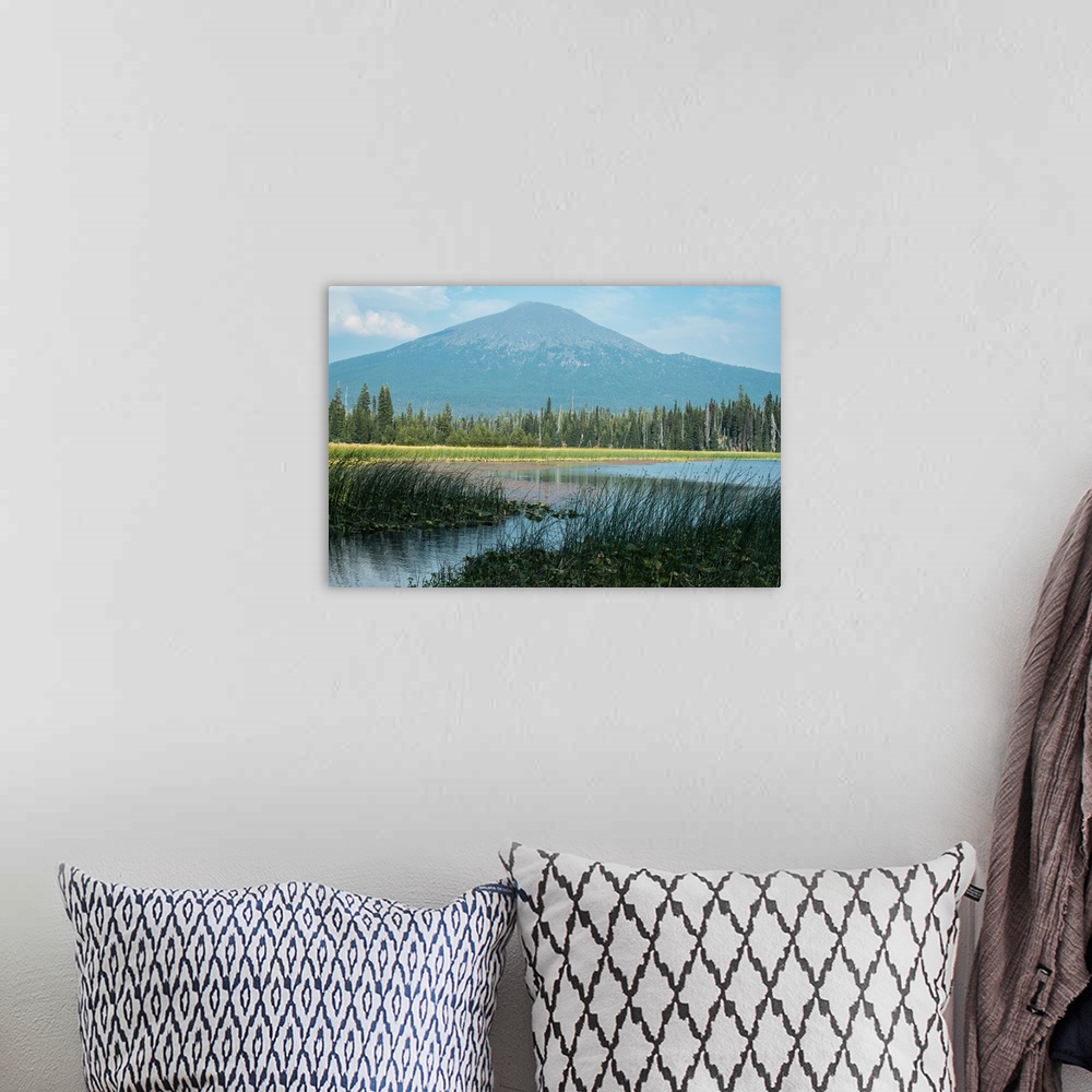 A bohemian room featuring Landscape photograph of water in front of Mount Bachelor in Oregon.