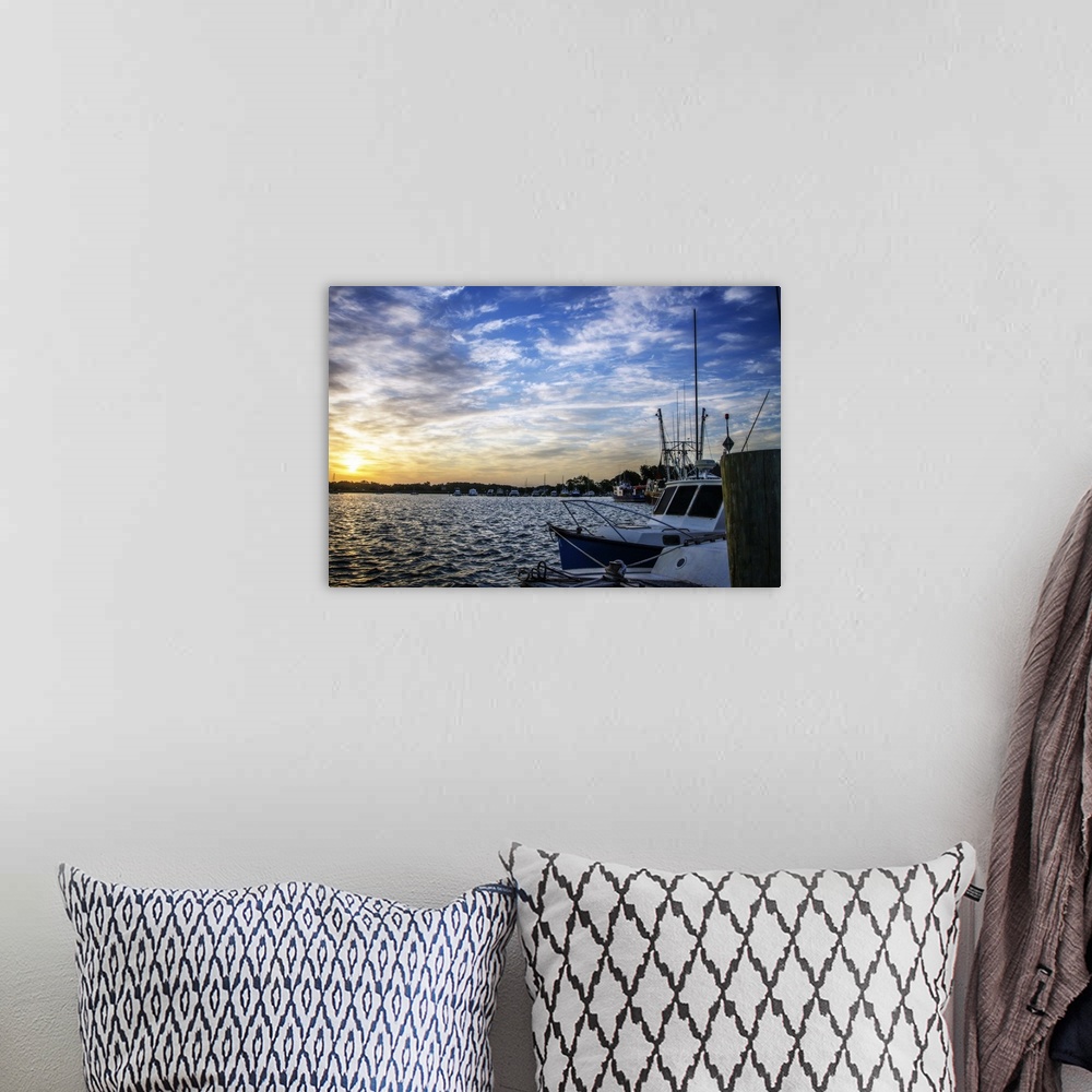 A bohemian room featuring Landscape photograph of boats docked in a marina at sunrise in Beaufort, SC.