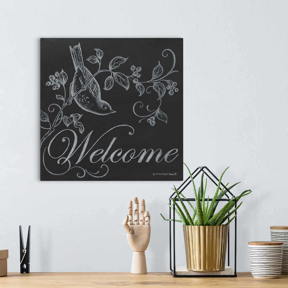 A bohemian room featuring Square chalkboard "Welcome" sign with white chalk illustration of a bird perched on a branch with...