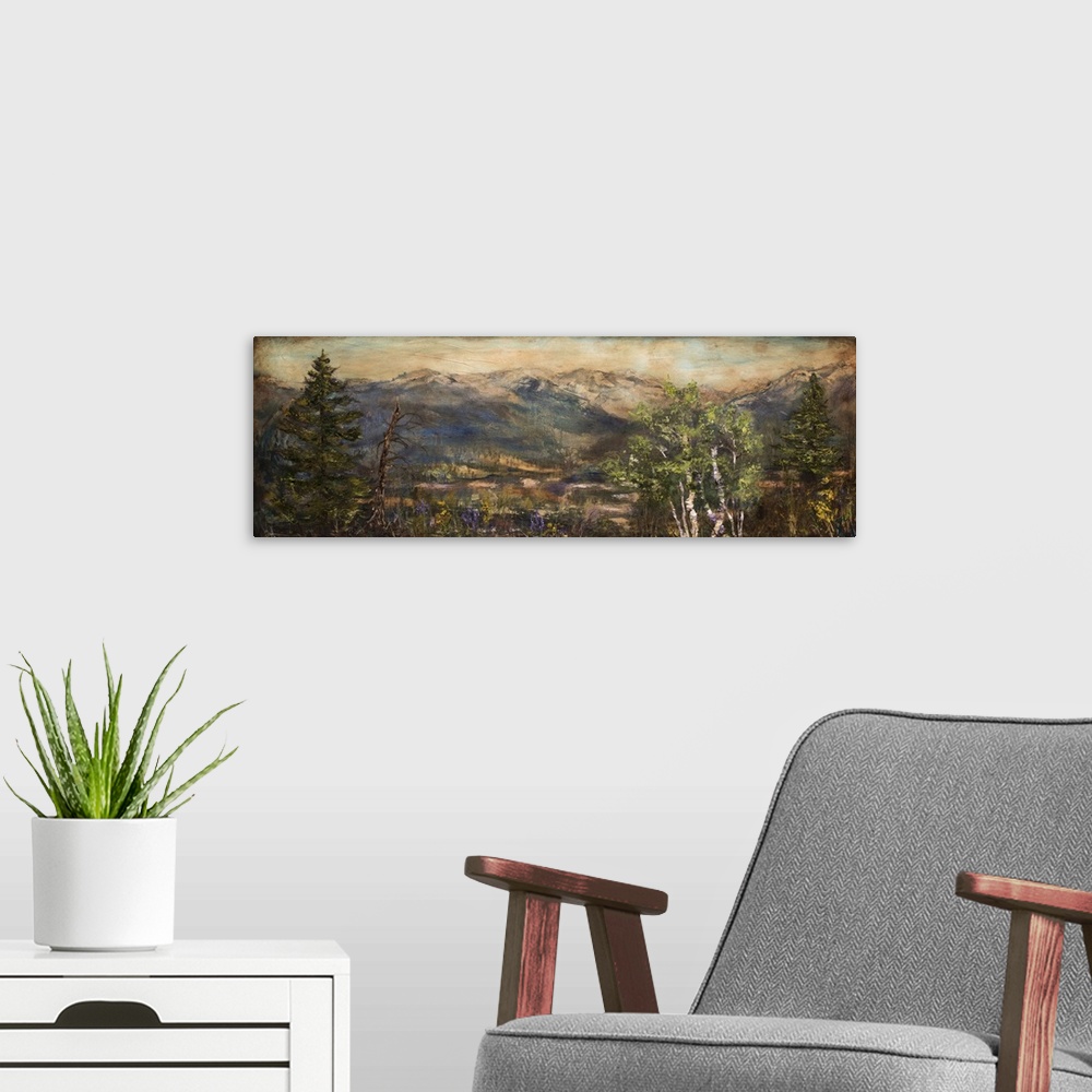 A modern room featuring Wide painting of a mountain scene with  purple and yellow wildflowers and green trees in the fore...