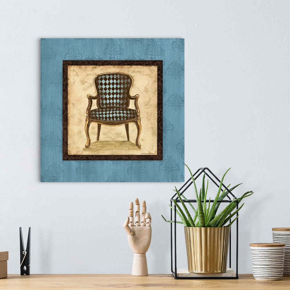A bohemian room featuring Square painting with a blue and brown checkerboard chair in the center with a tan background and ...