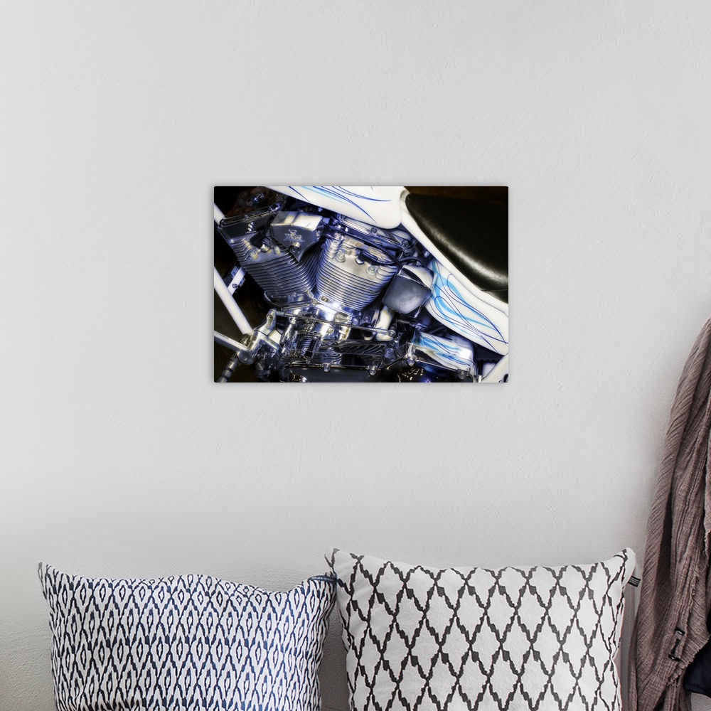 A bohemian room featuring Fine art photograph of a harley davidson motorcycle, focusing on the engine.