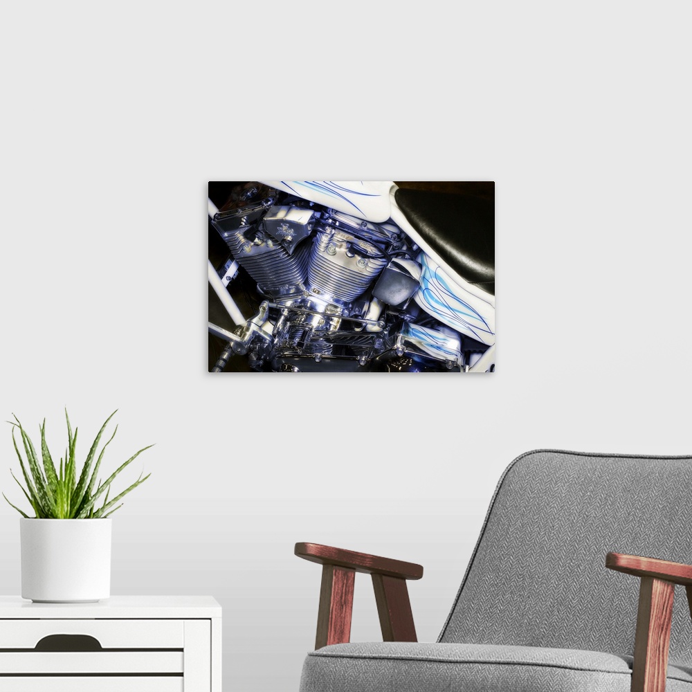 A modern room featuring Fine art photograph of a harley davidson motorcycle, focusing on the engine.