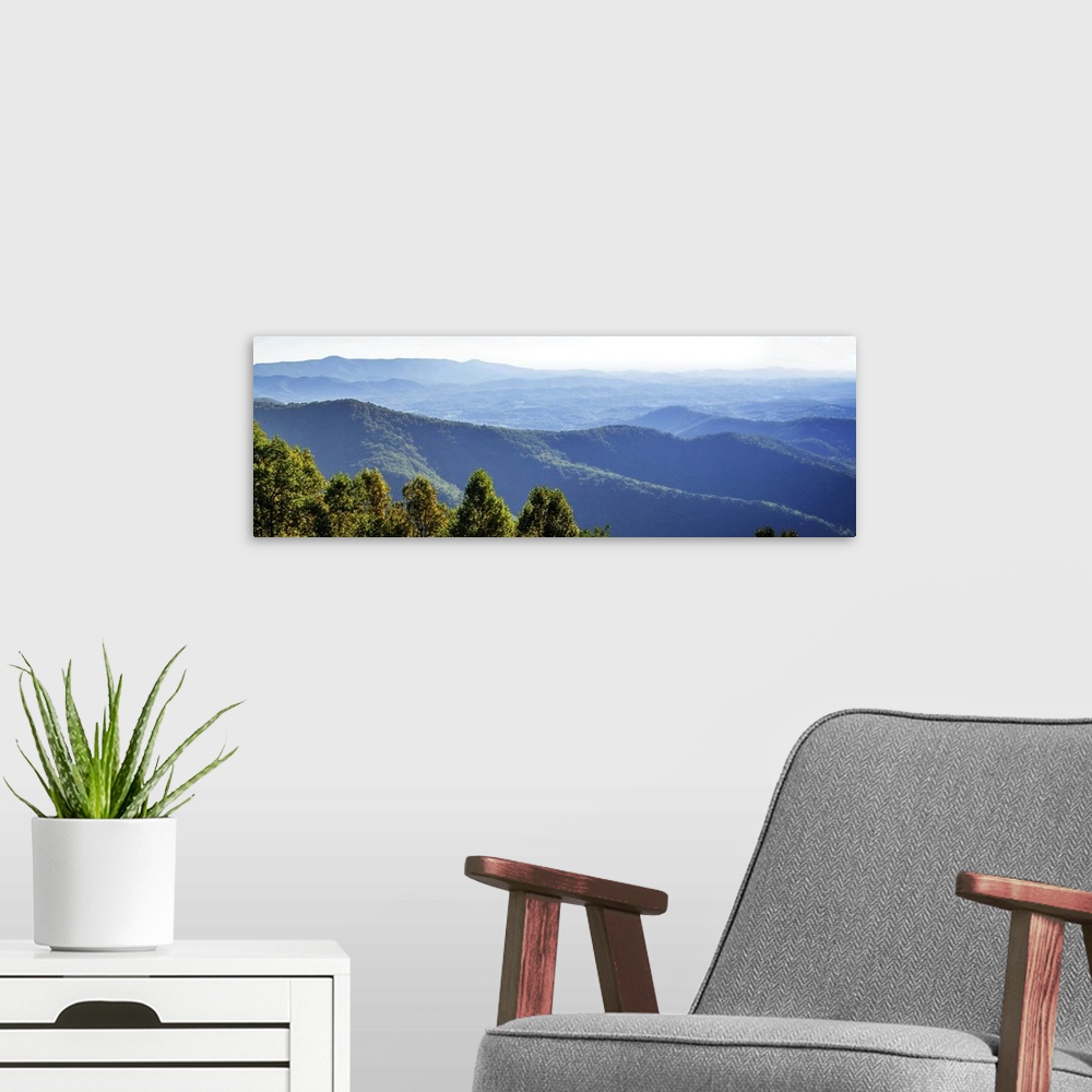 A modern room featuring Panoramic view of the blue hills of the Smokey Mountains in North Carolina.