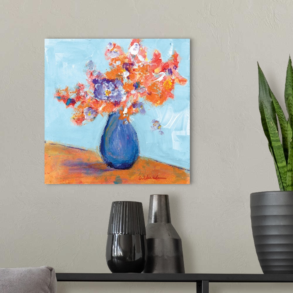 A modern room featuring Square painting of a bouquet of flowers in a blue vase.