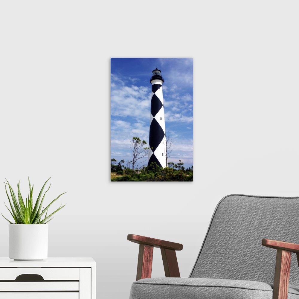 A modern room featuring Cape Lookout Lighthouse