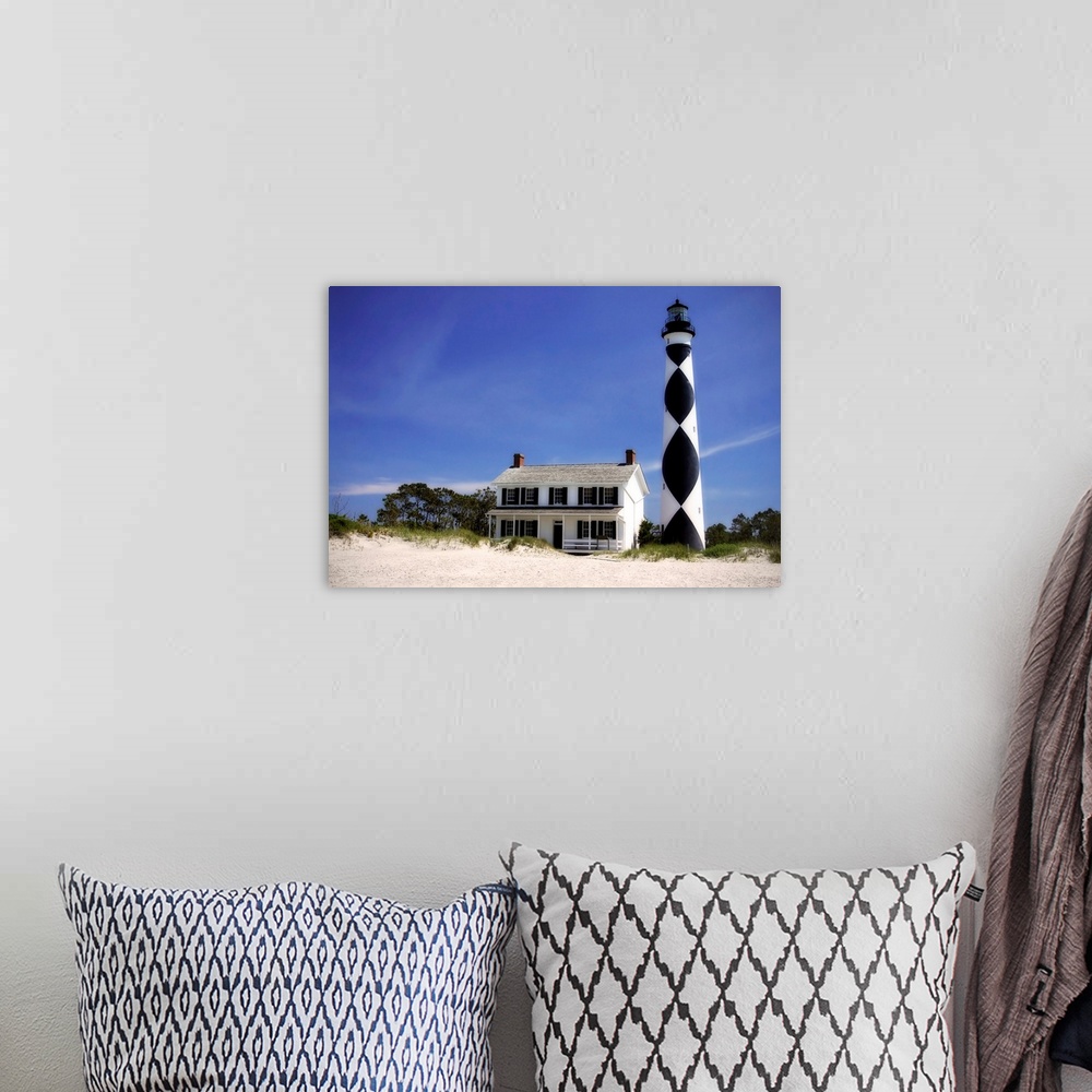 A bohemian room featuring Cape Lookout Light 1