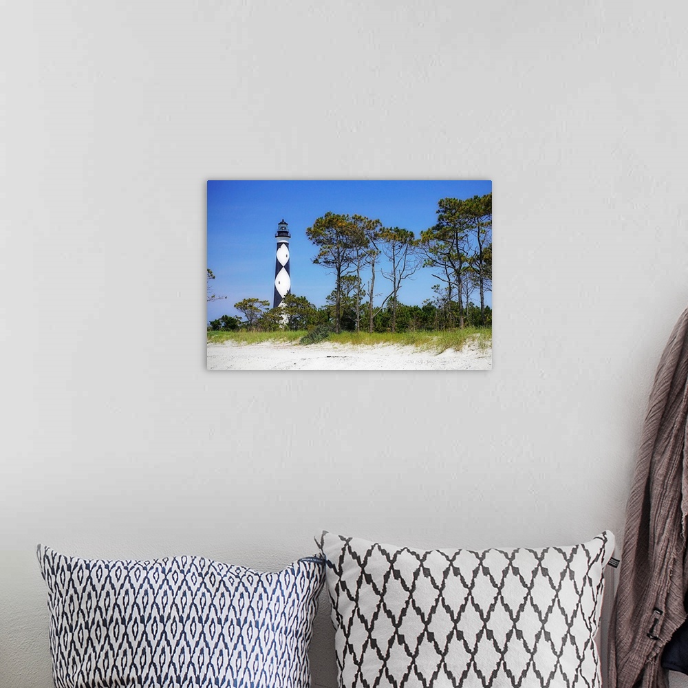 A bohemian room featuring Cape Lookout Light 3