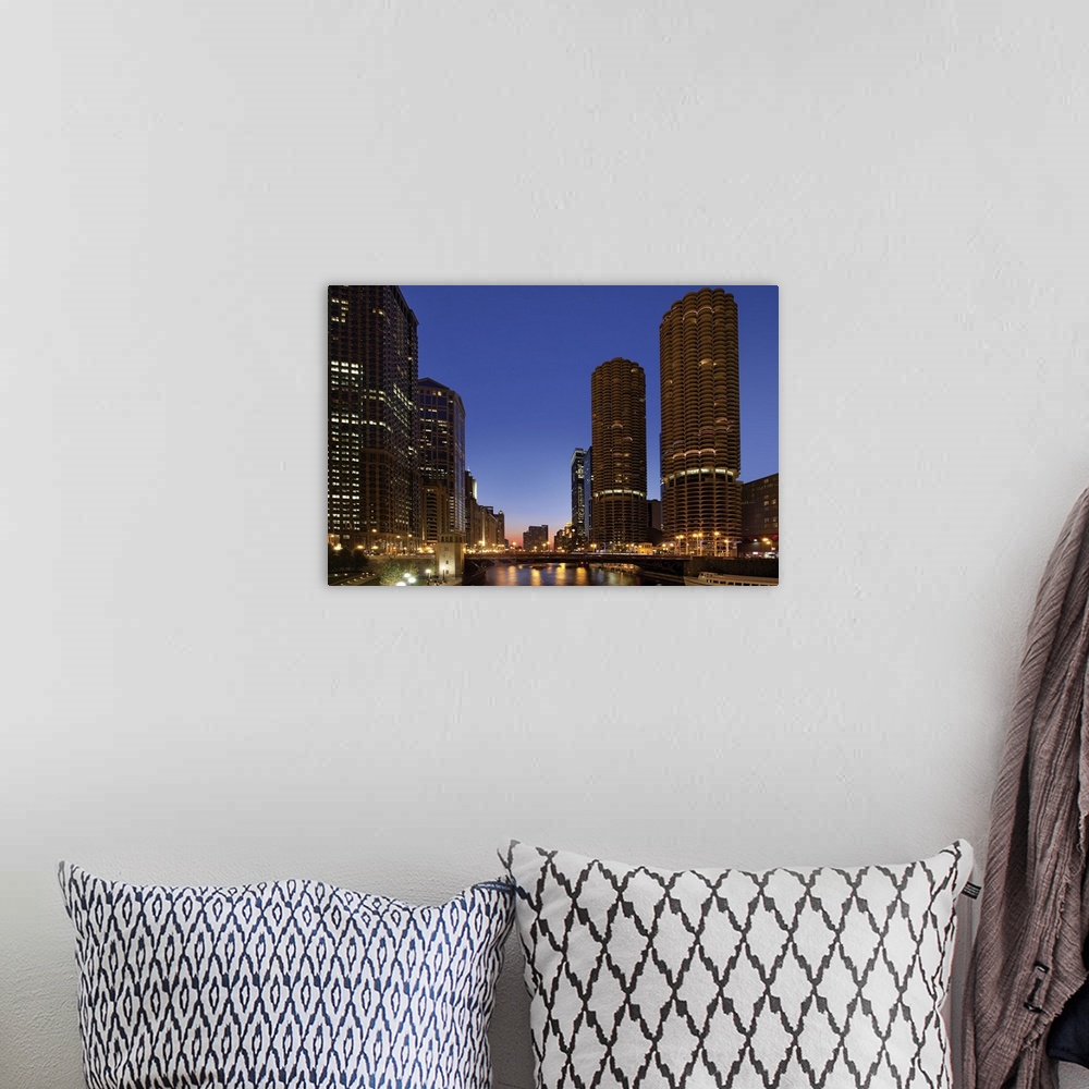 A bohemian room featuring Dusk scene of Chicago skyline with Marina Towers along river