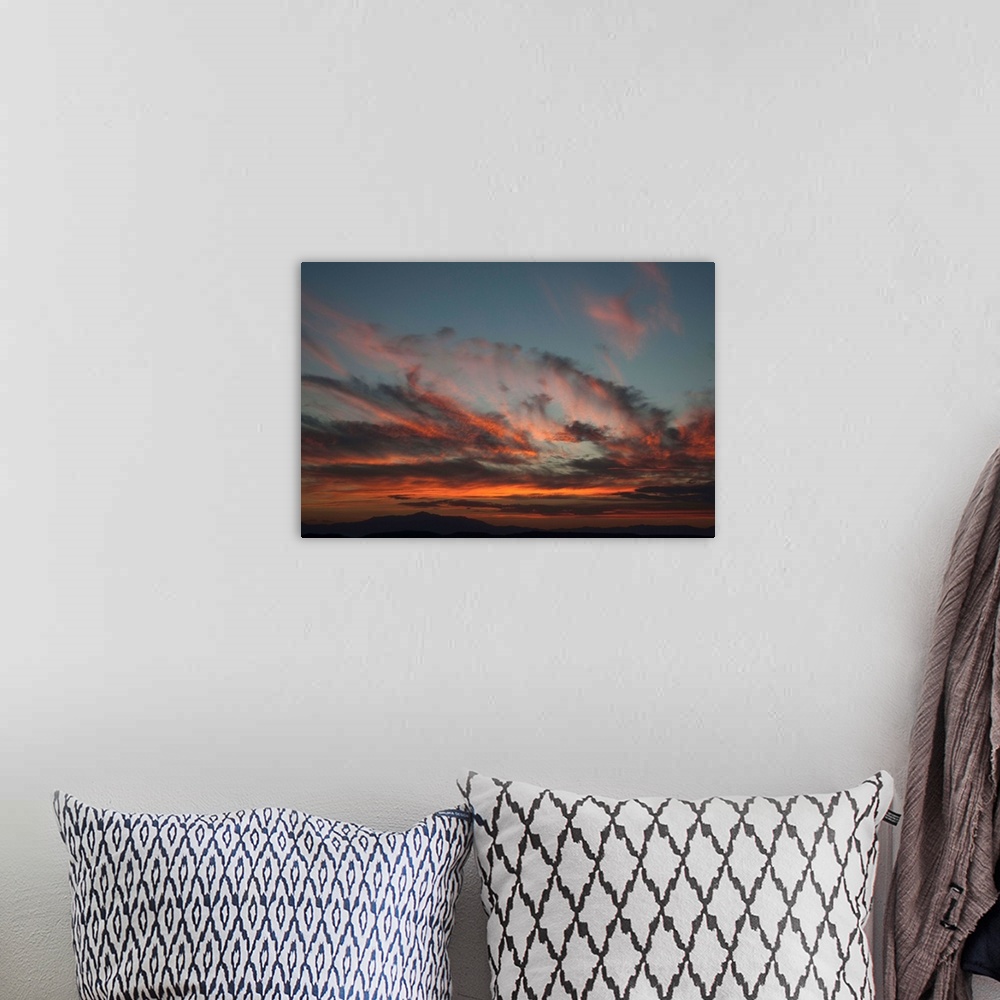 A bohemian room featuring Cloudy Sunset I